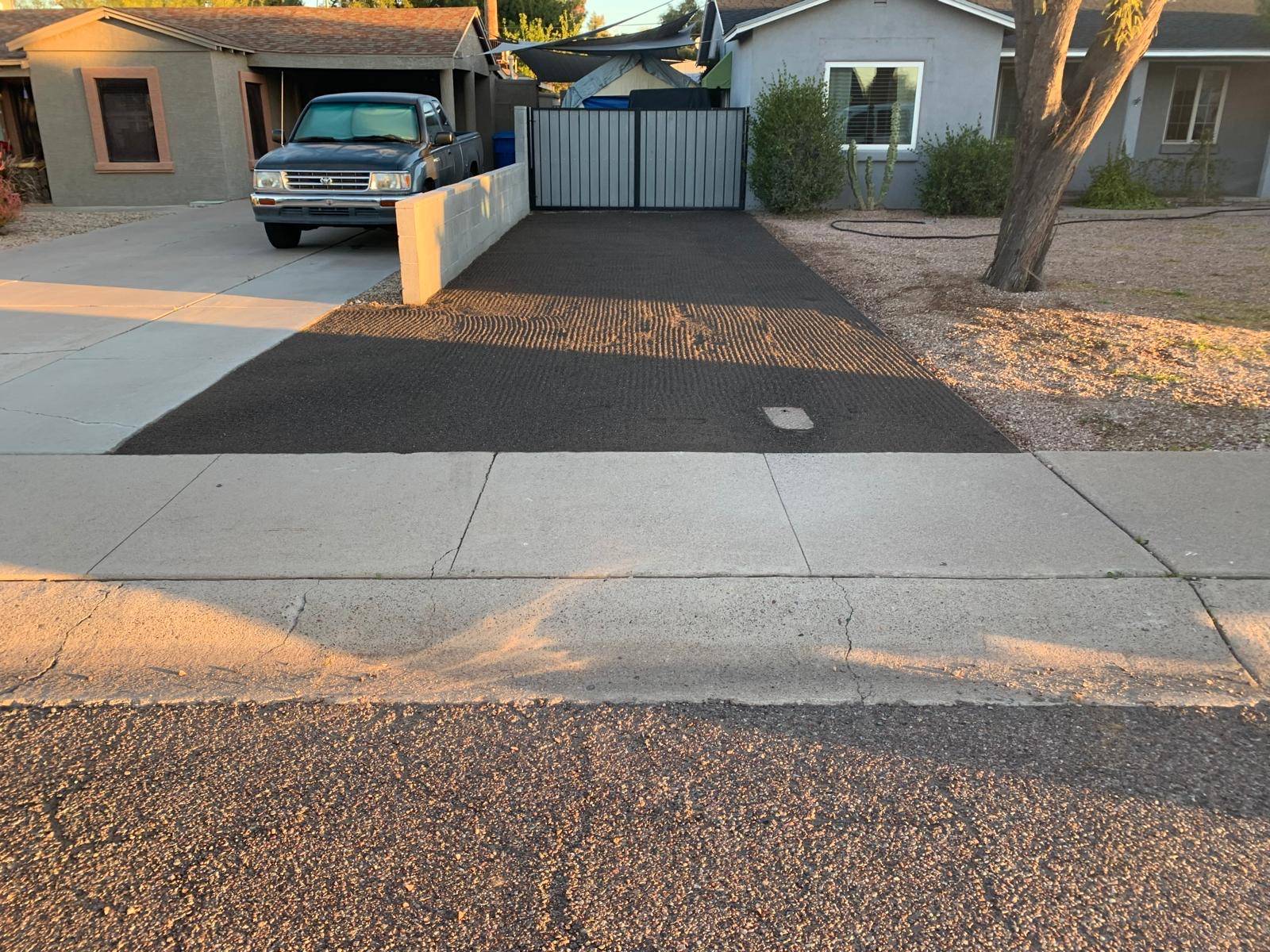 The same area finished with dark crushed rock in front of the gate